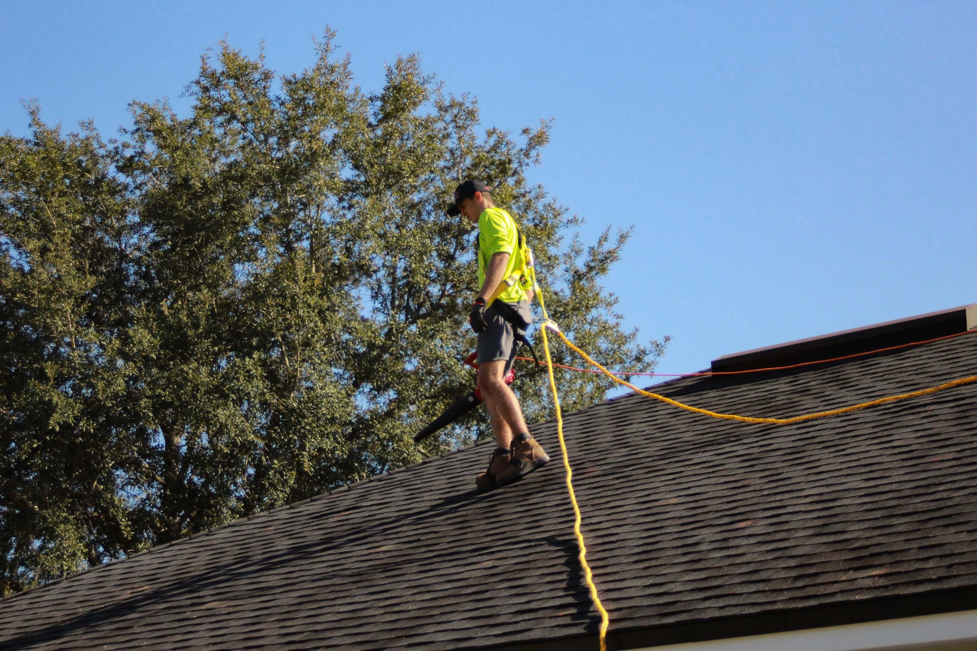 a roofer surveying the jobsite